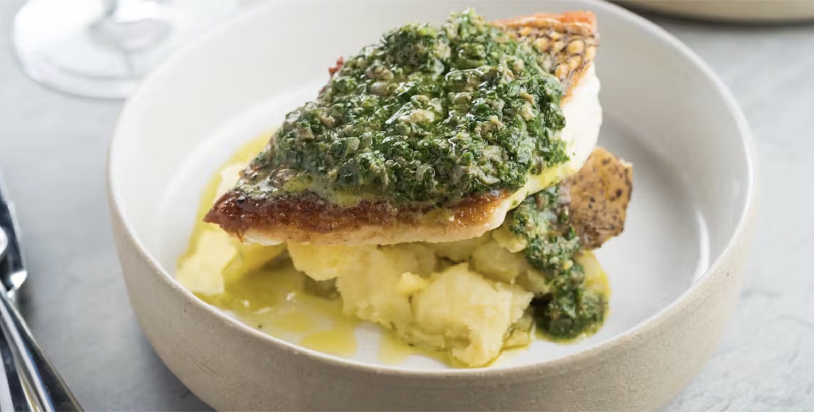 Grande Pesce — fish fillet with salsa verde over crushed potatoes